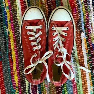 faded but good condition red low top converse